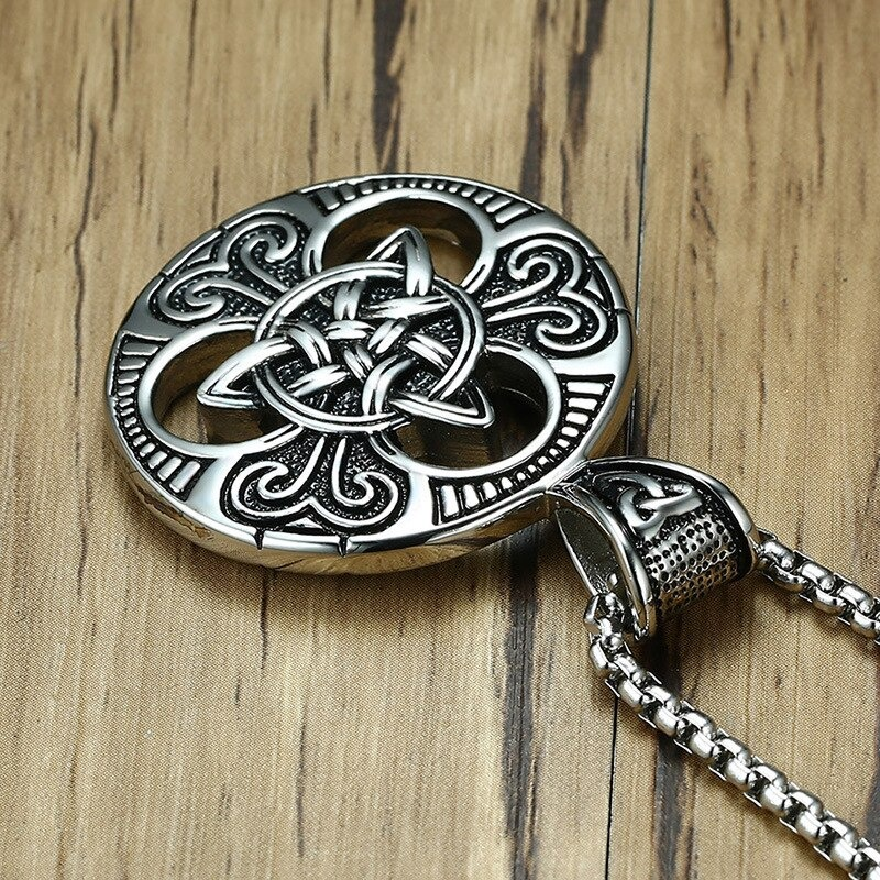 Stainless steel Celtic knot pendant showcasing intricate vintage design, perfect for men and women.