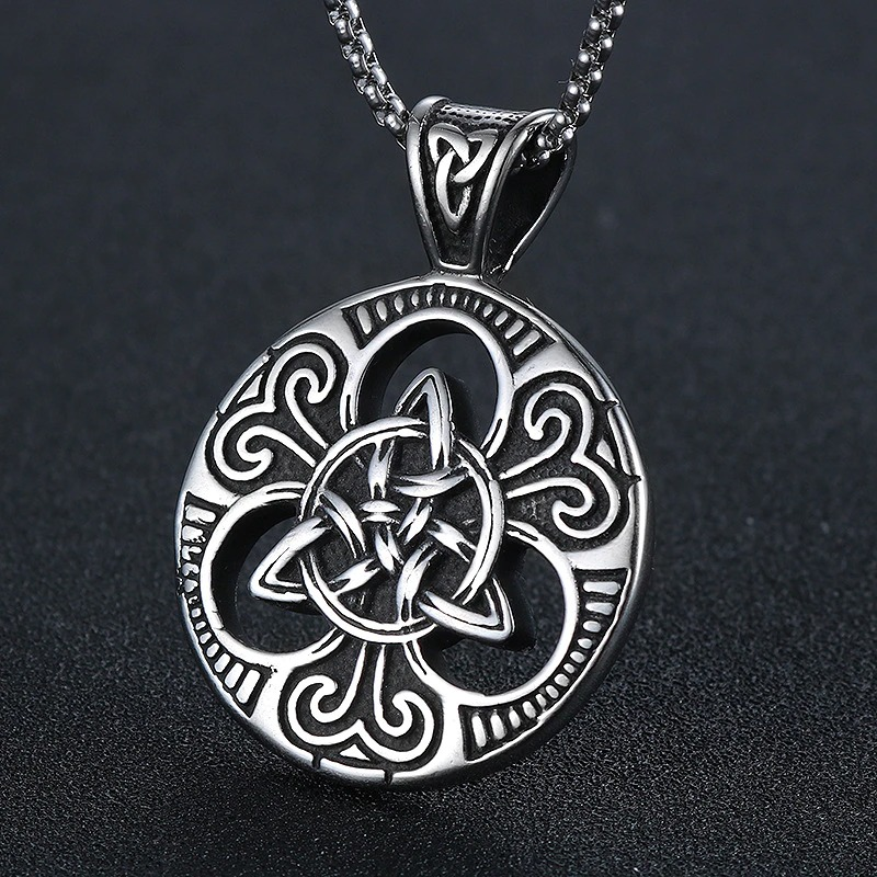 Vintage stainless steel Celtic knot pendant with intricate design, perfect for men and women, on a fine chain.