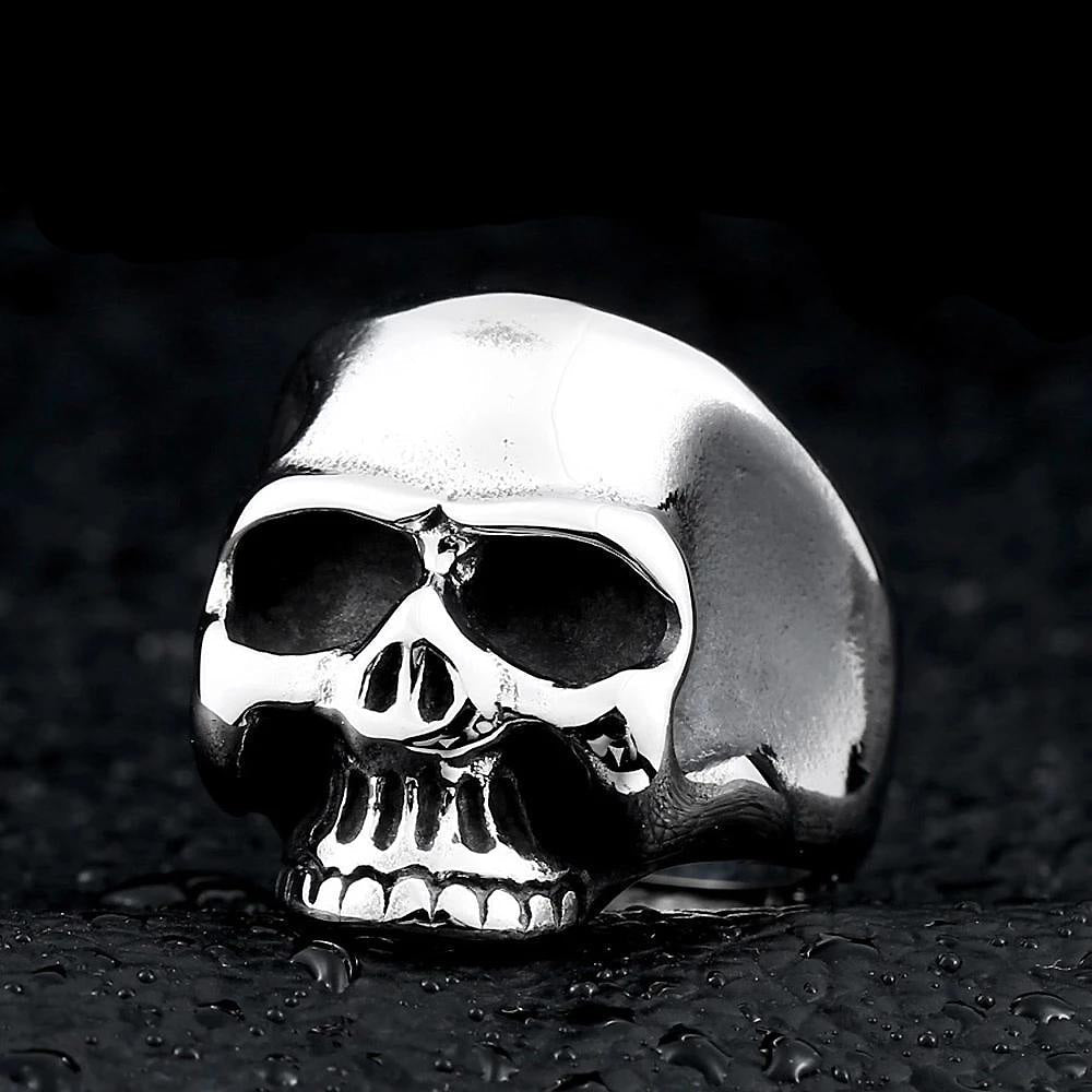 Stainless steel skull ring with a high polished finish, perfect for alternative fashion and edgy accessories.