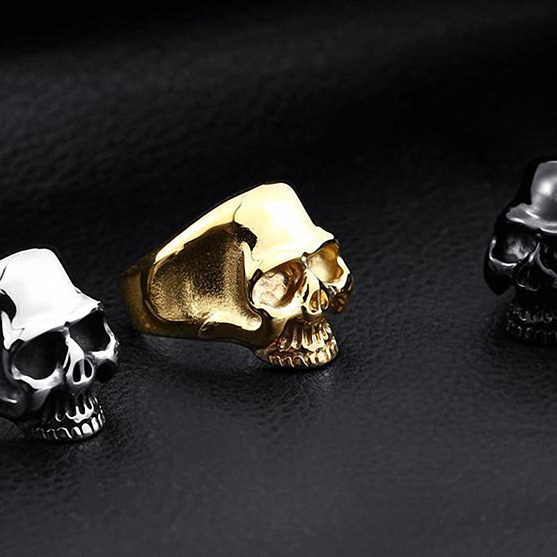 Stainless Steel Cute Skull Ring set - shiny gold and black skull designs, perfect for alternative fashion lovers.