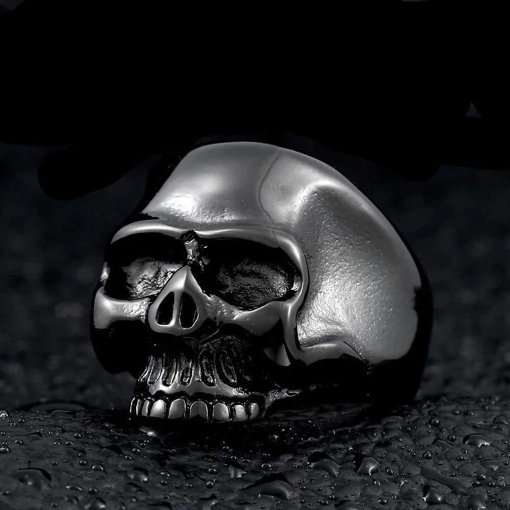 High polished stainless steel skull ring showcasing fierce design, perfect for alternative fashion lovers and rock accessories.