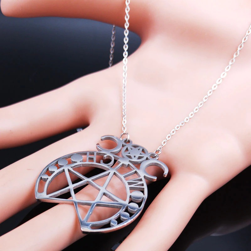 Stylish stainless steel gothic pentagram pendant necklace showcasing witchcraft symbols, perfect for alternative fashion.
