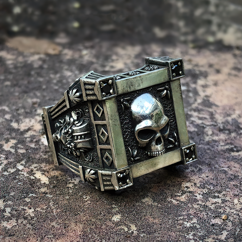 Stainless steel gothic ring featuring a skull design and decorative elements for a bold biker style.