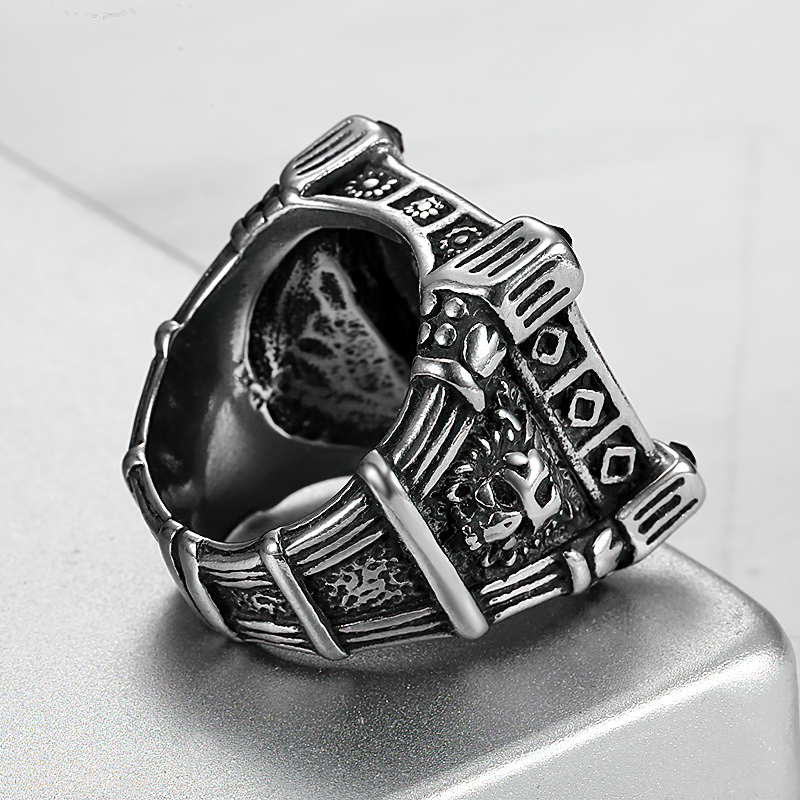 Stainless steel gothic ring showcasing intricate designs with skull and floral motifs, perfect for biker style jewelry.