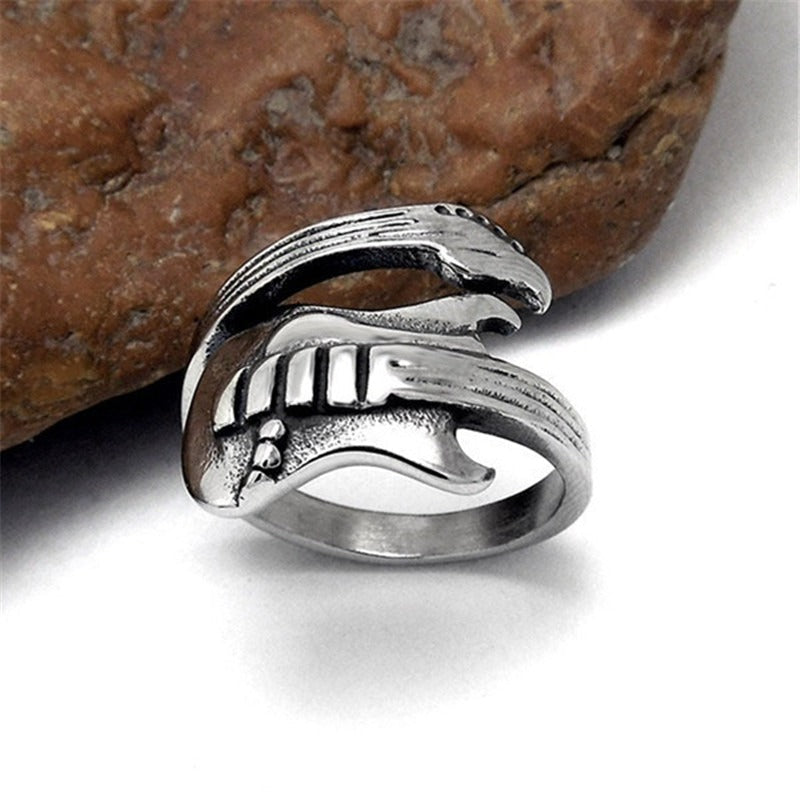 Stainless steel guitar ring for men and women, rock style jewelry, perfect for musicians and rock enthusiasts.