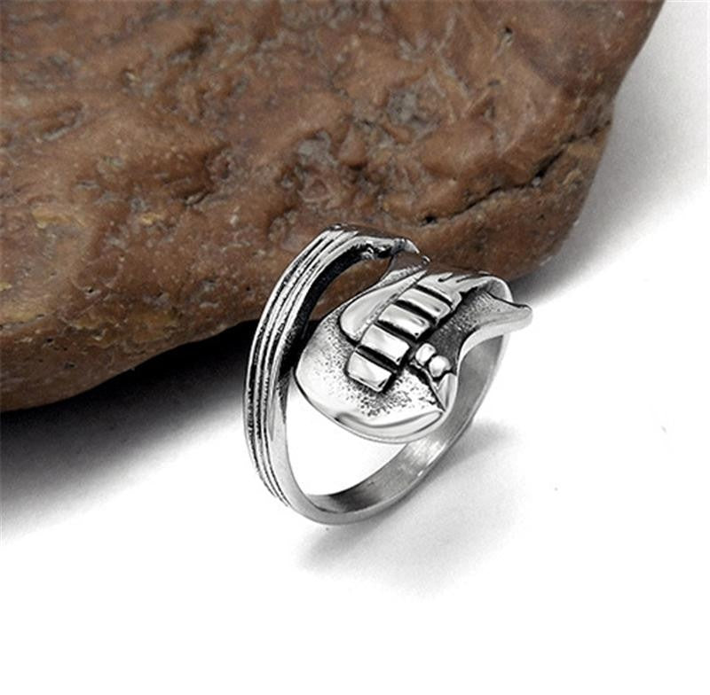 Stainless steel guitar ring with rock style, perfect unisex jewelry for musicians and rock enthusiasts.