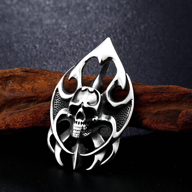 Stainless steel skull pendant with intricate flame design, perfect for gothic fashion and unisex style.