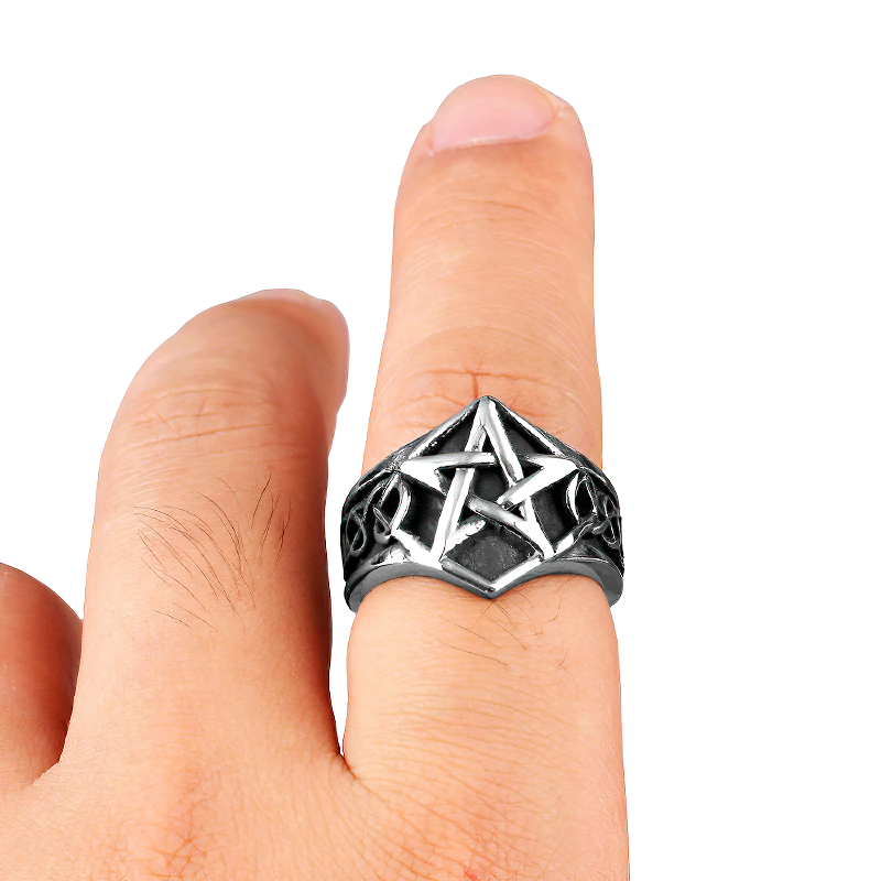 Stainless steel pentagram unisex ring worn on a finger, perfect for gothic, rock, or punk styles.