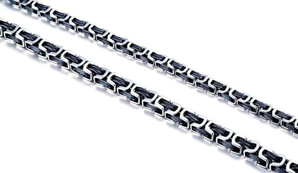 Stylish stainless steel biker necklace with unique geometric twisted Singapore chain design.