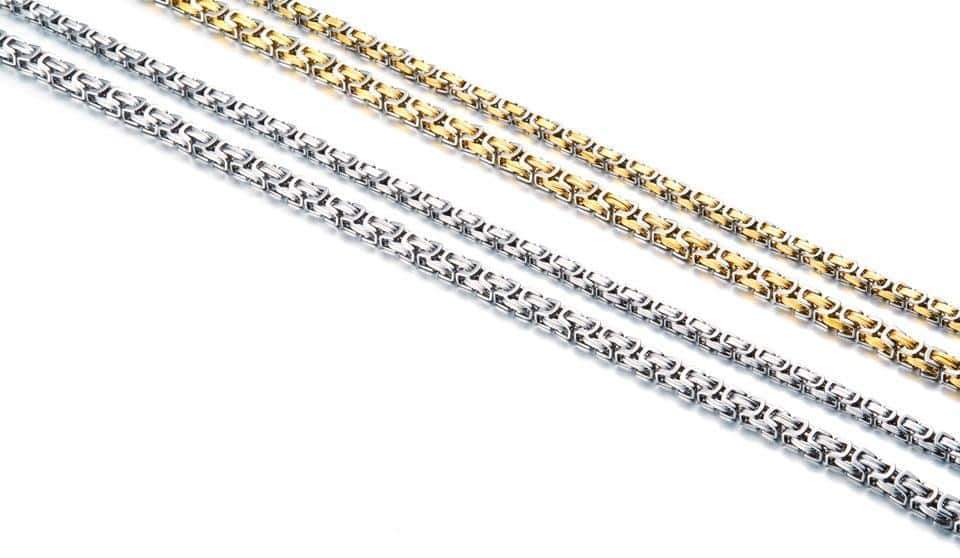 Stylish stainless steel biker necklace with unique twisted Singapore chain in silver and gold colors.