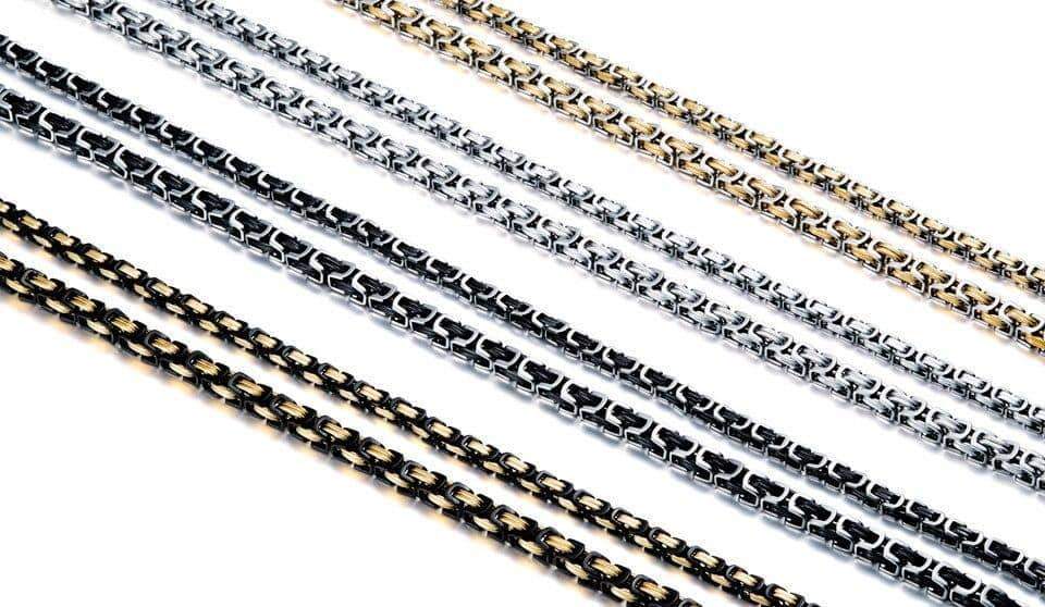 Stylish stainless steel biker charm necklaces with geometric patterns in various colors, perfect for trendy accessories.