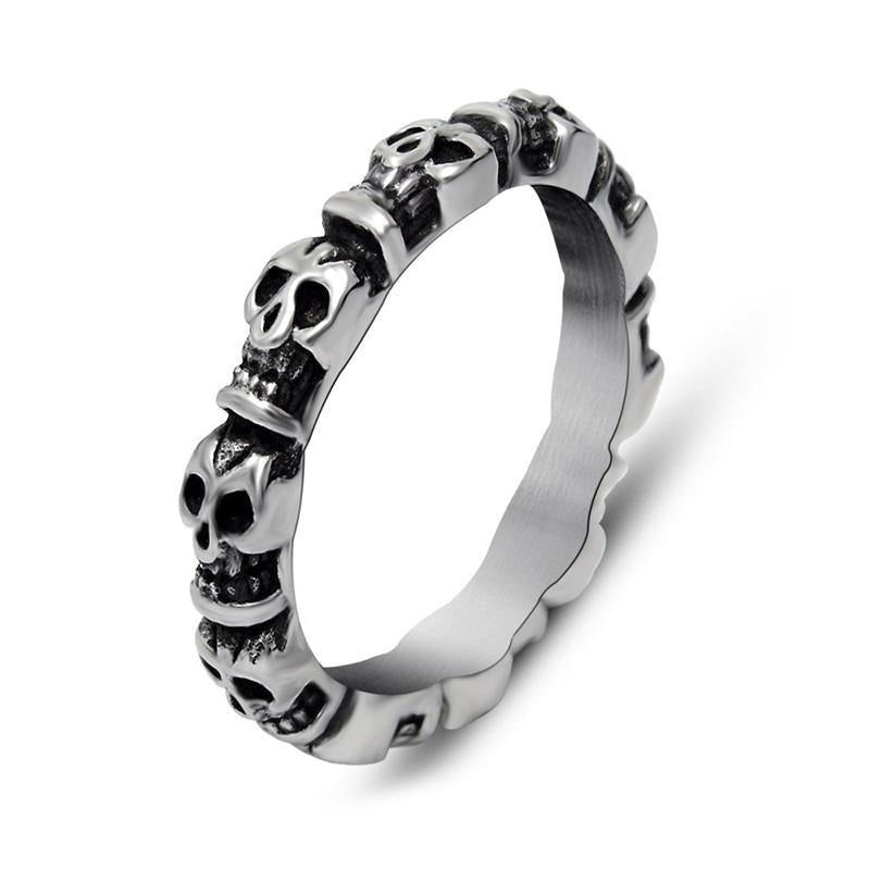 Round stainless steel skull ring featuring a striking punk design, unisex alternative jewelry for men and women.
