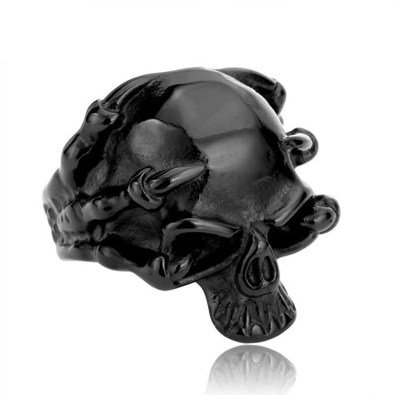 Stainless steel skull ring with claw design, perfect for rock concerts and edgy biker fashion.