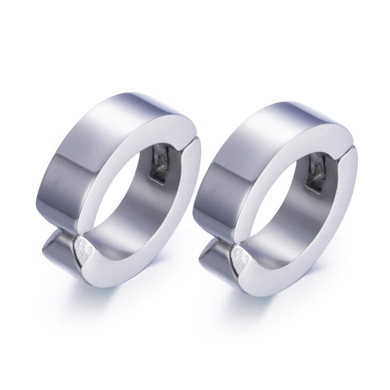 Stylish stainless steel stud earrings, perfect unisex accessory for rock-inspired fashion looks.