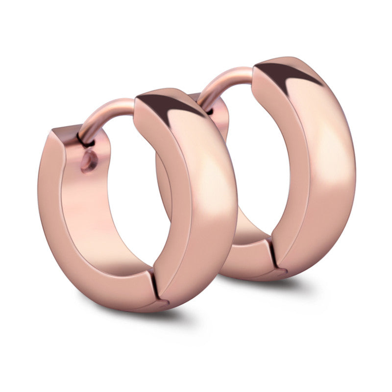 Stylish rose gold stainless steel hoop earrings perfect for both men and women, adding a chic touch to any outfit.