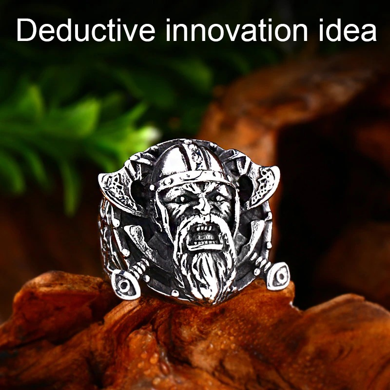 Vintage stainless steel Vikings ring featuring Odin's shield with a fierce warrior face and detailed craftsmanship.