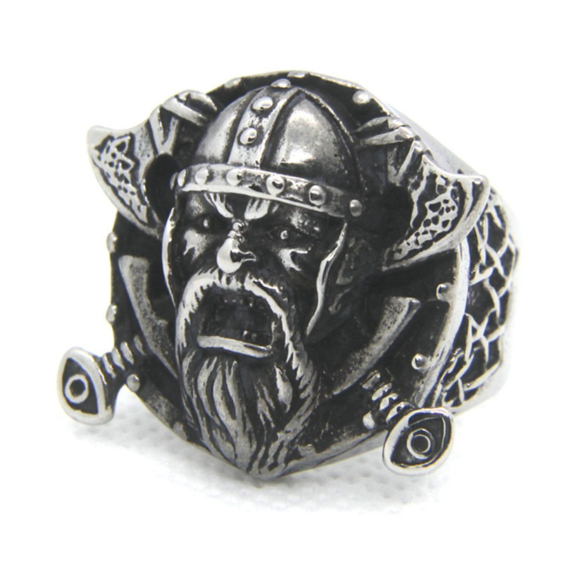 Viking-themed stainless steel ring featuring a warrior's face and crossed weapons, crafted in vintage style.