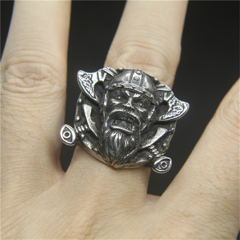 Stainless steel Vikings ring featuring Odin's shield, showcasing a detailed warrior face design on a sturdy band.