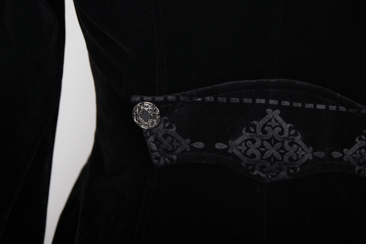 Close-up of the elegant design on a black velvet steampunk coat with a decorative button.