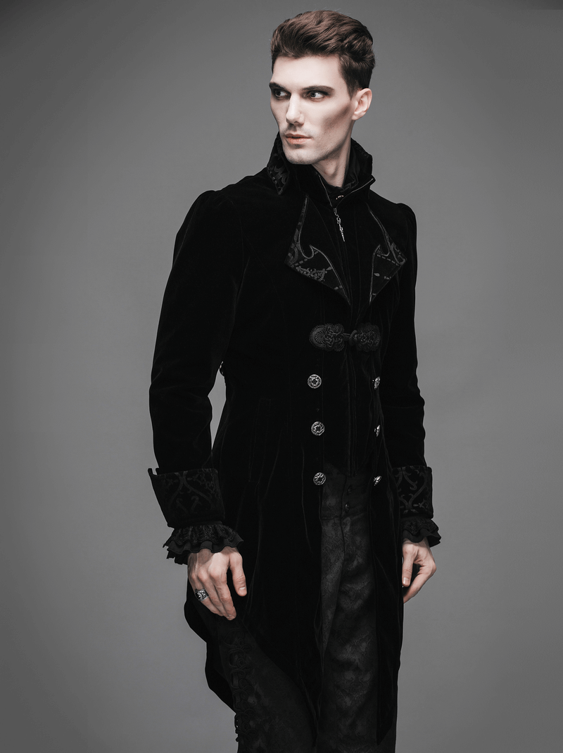 Stylish man in a steampunk black velvet coat with intricate design details, perfect for gothic and renaissance-inspired outfits.