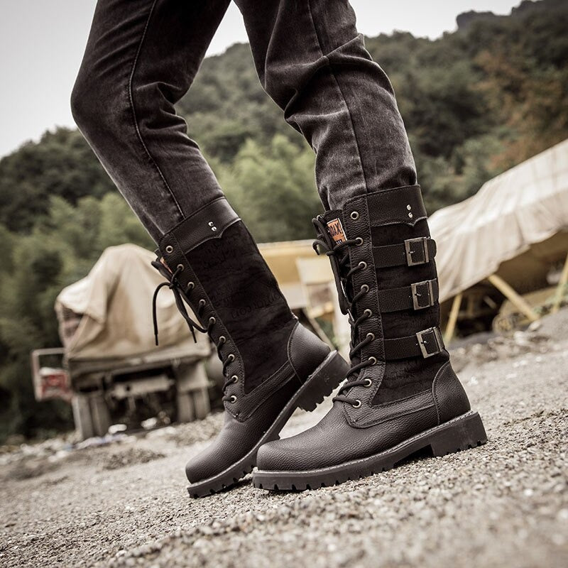 Steampunk mid-calf military combat boots with lacing and buckles, perfect for alternative fashion and rock outfits.