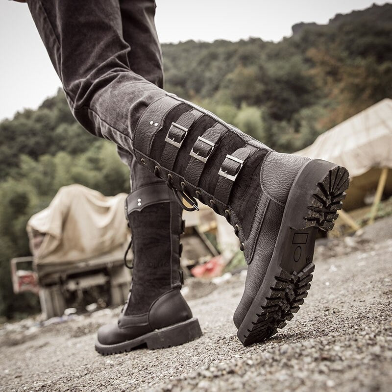 Mid-calf steampunk combat boots with straps, perfect for alternative fashion and rugged styles.