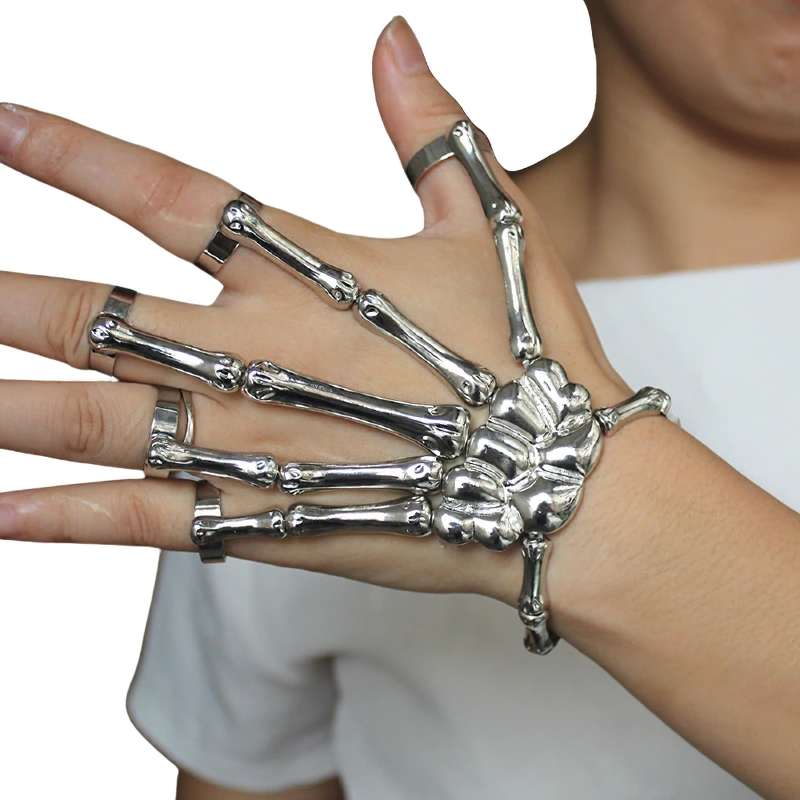 Unisex gothic skeleton bracelet on a hand, featuring intricate bone designs, adjustable for comfort and style.
