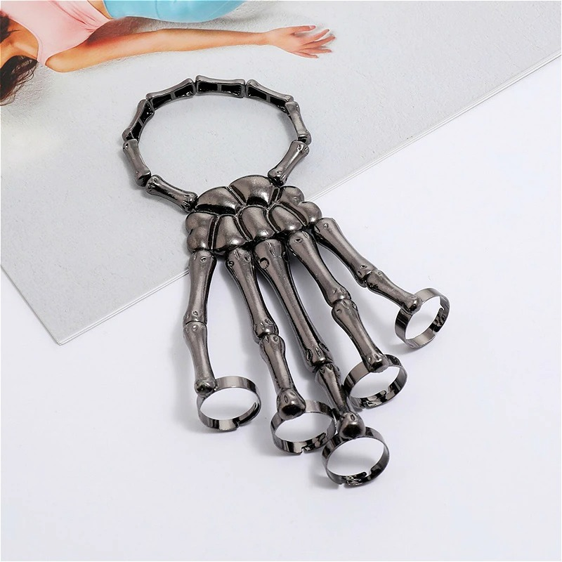 Unisex gothic skeleton hand bracelet, stylish elastic adjustable design for men and women.