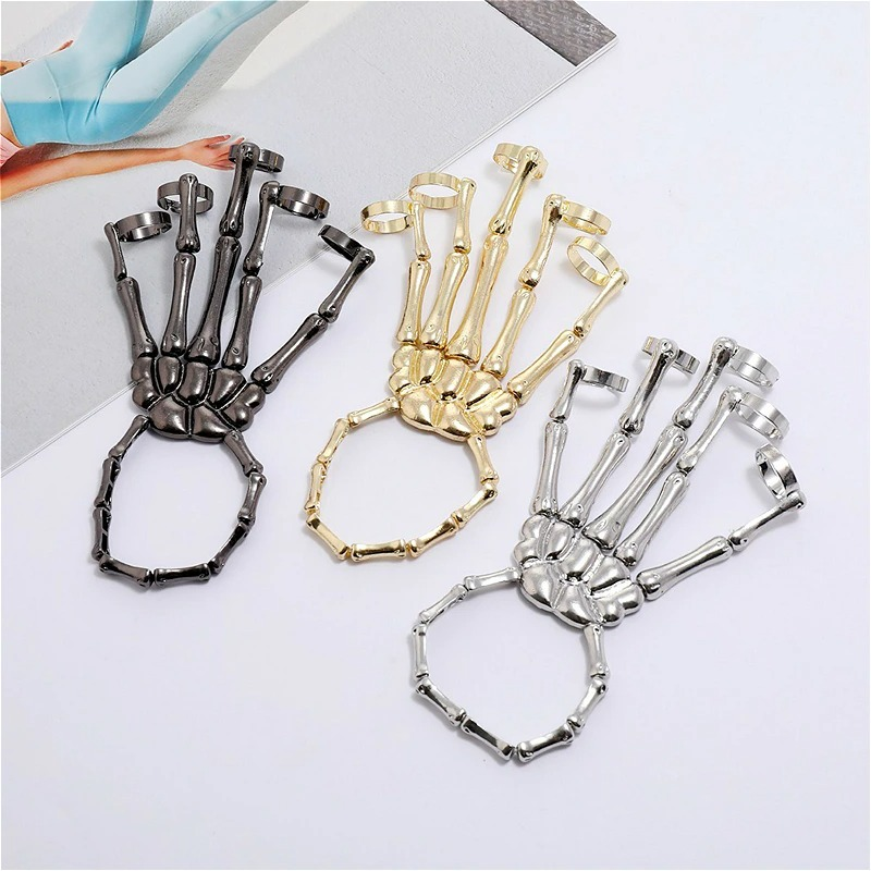 Stylish unisex gothic skeleton bracelets in black, gold, and silver, perfect for a unique fashion statement.