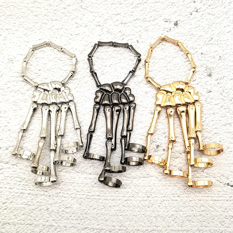 Unisex steampunk skeleton bracelet featuring three colors: silver, black, and gold. Adjustable elasticity for comfortable wear.