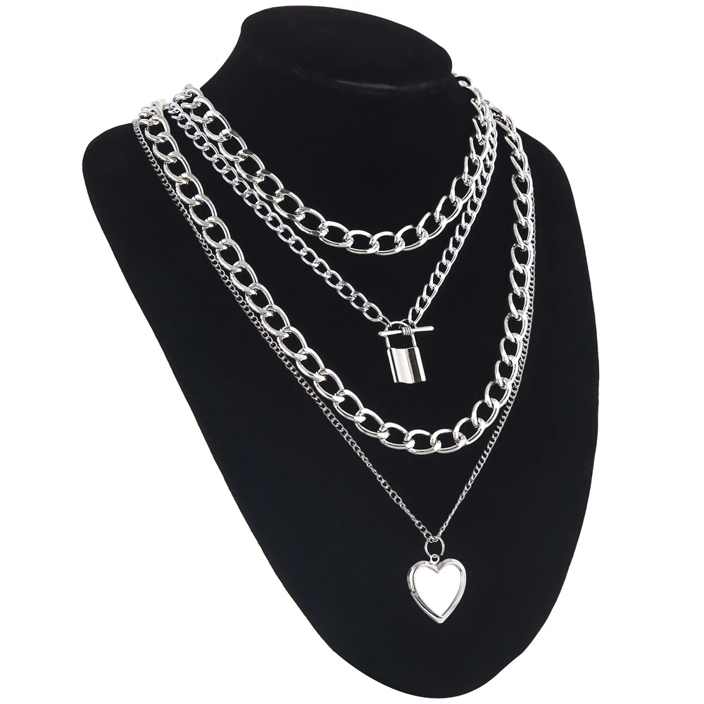Steampunk fashion chain necklace for women with layered aluminium pendants: heart and lock, perfect for various outfits.