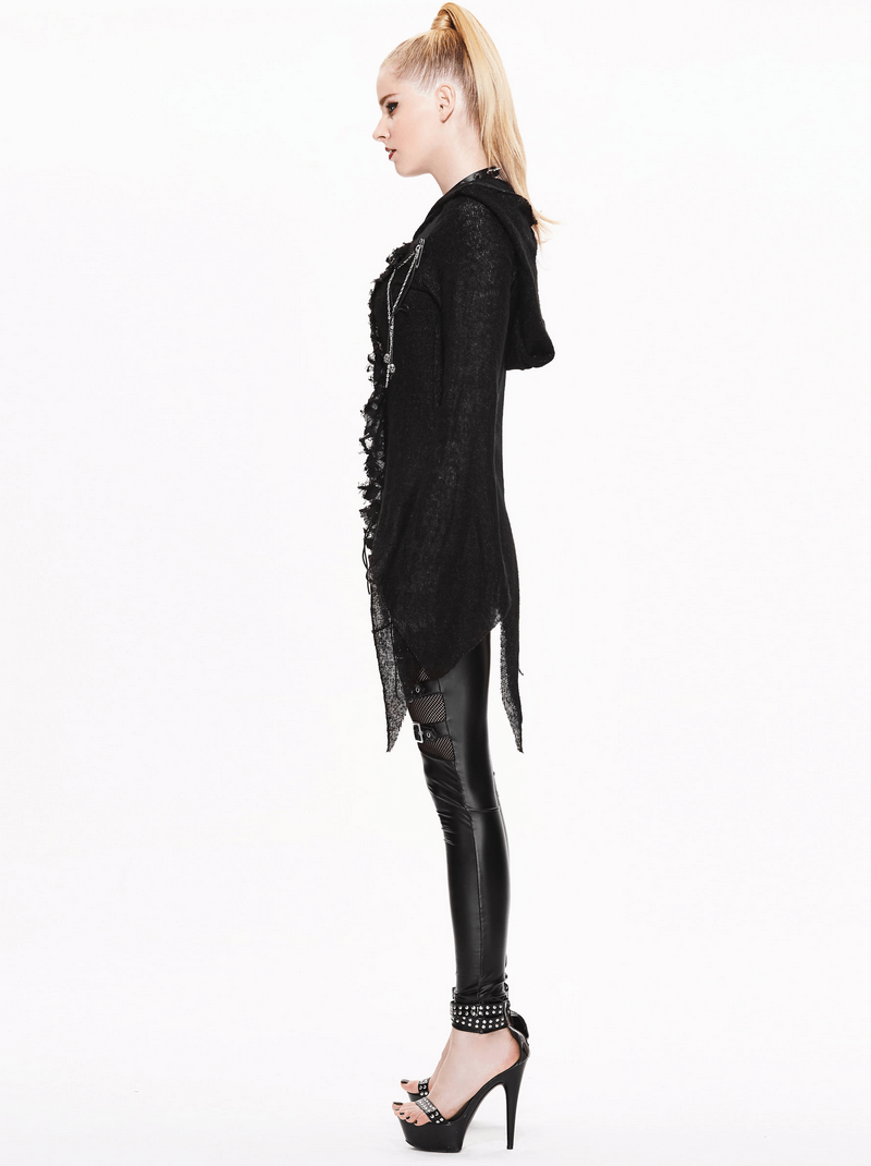 Side view of a woman in a black Gothic asymmetrical hooded sweater and sleek leggings, showcasing edgy fashion.