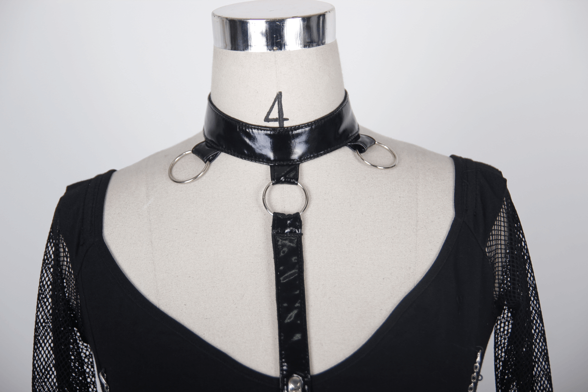Close-up of a stylish steampunk gothic black top featuring mesh sleeves and a chic shiny collar with rings.