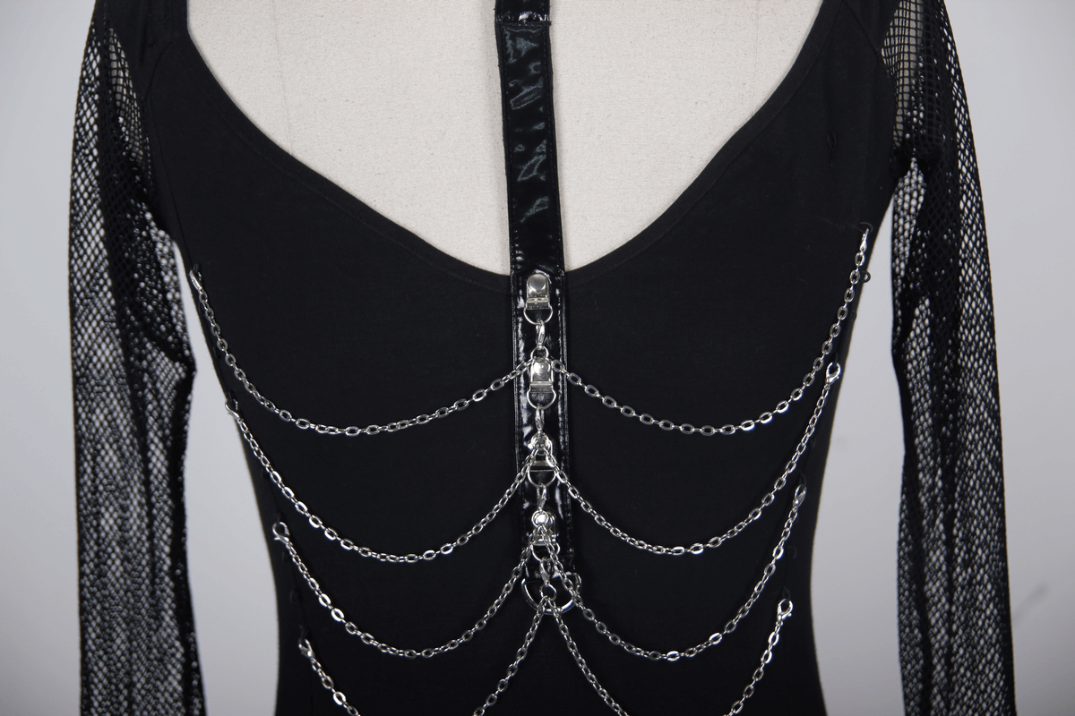 Close-up of the back detail of a steampunk gothic black top with chains and mesh sleeves.