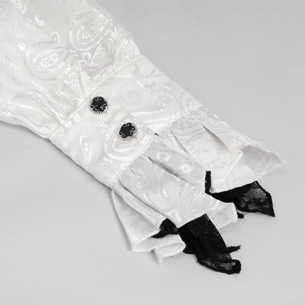 Close-up of a steampunk white men's shirt cuff with elegant black tie collar and detailed fabric design.