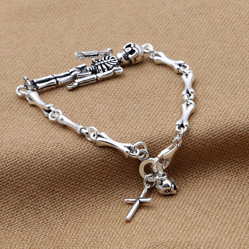 Stylish unisex sterling silver skeleton bracelet with skull and cross charm, perfect punk accessory for any outfit.