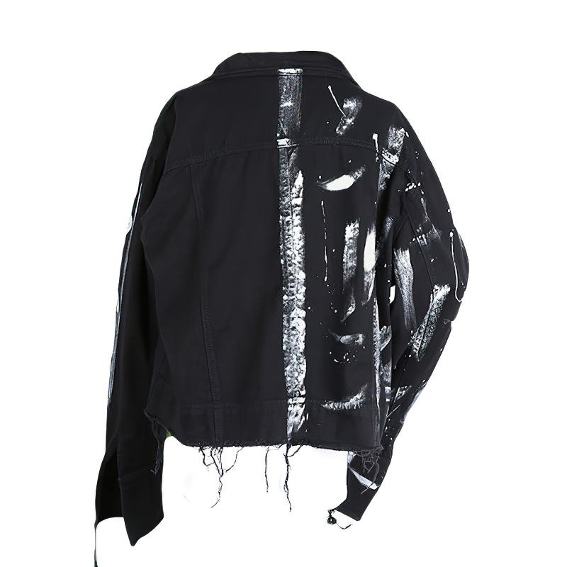 Men's graffiti print jeans jacket featuring a trendy streetwear design with a unique paint splatter effect.