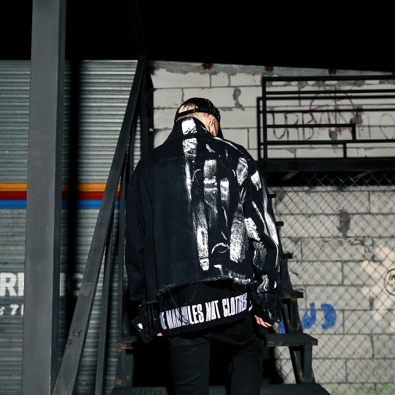 Men's graffiti print jeans jacket in black, showcasing edgy streetwear style, perfect for stylish outfits.