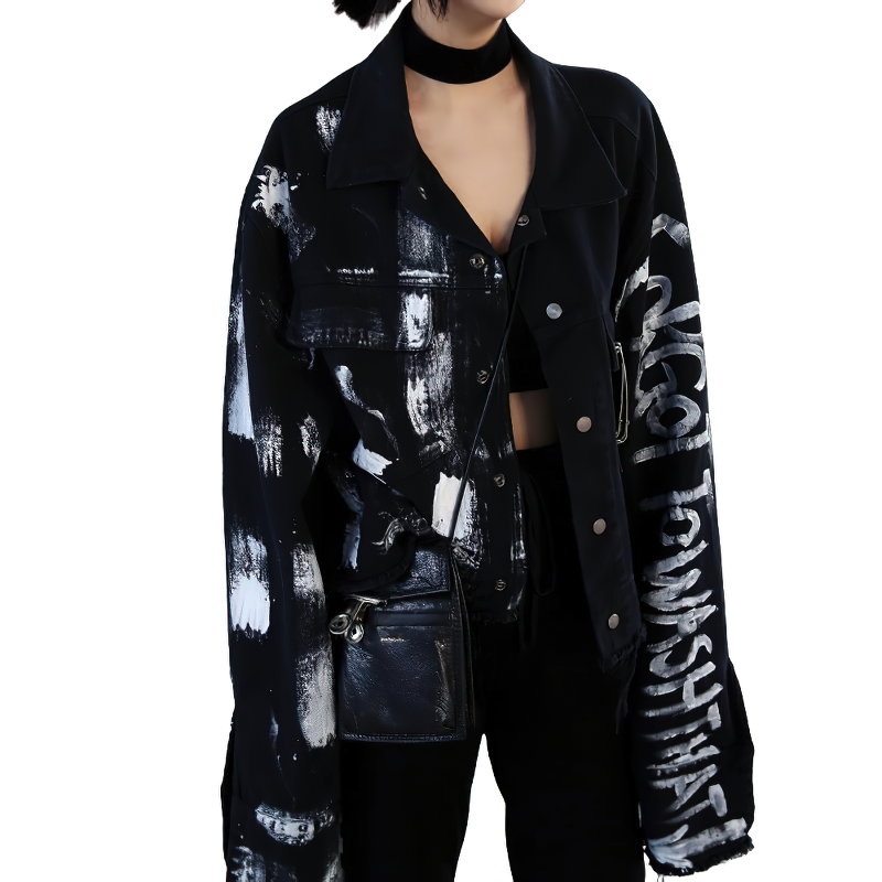 Trendy women's graffiti print jeans jacket, perfect for streetwear and modern fashion looks.