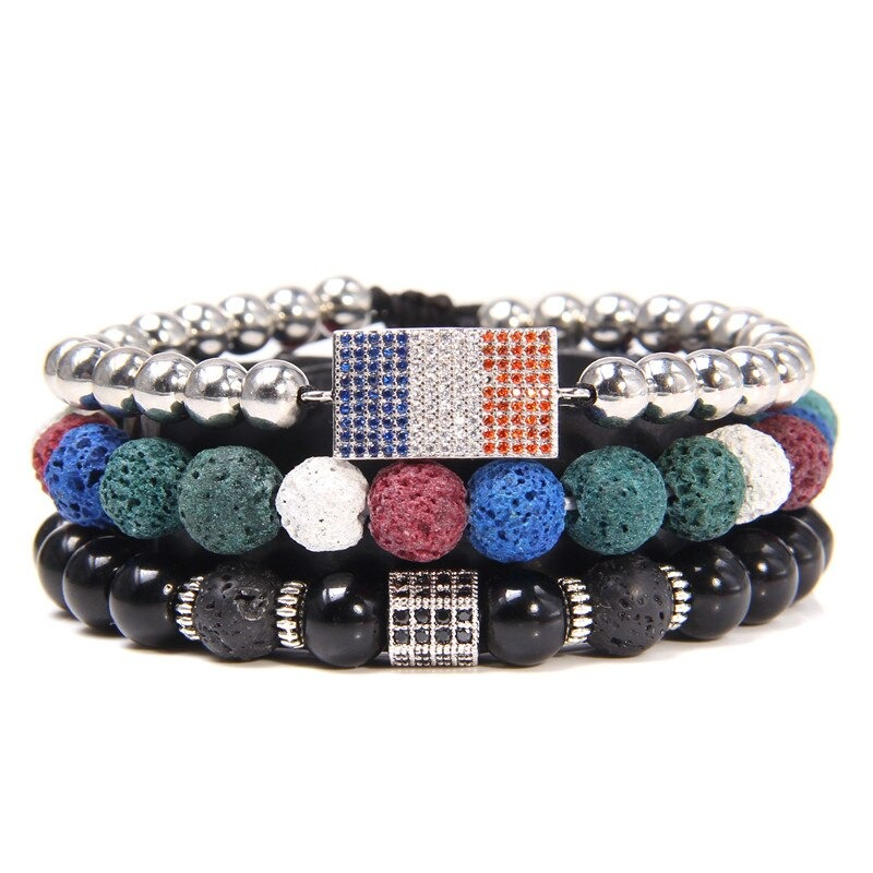 Handmade vintage charm bracelet with natural stone beads and flag pendant in a colorful layered design.