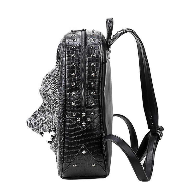 Stylish 3D wolf head faux leather backpack side view with zippers and studded details for a rock-inspired look.