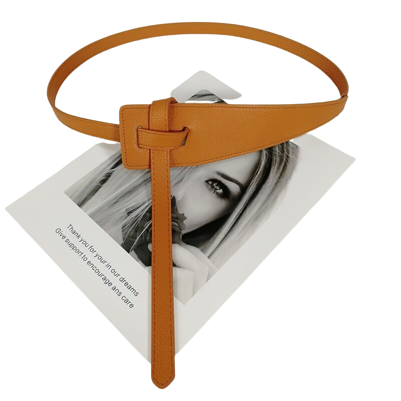 Stylish women's soft PU leather belt in orange color, perfect for casual outfits and wide coats.