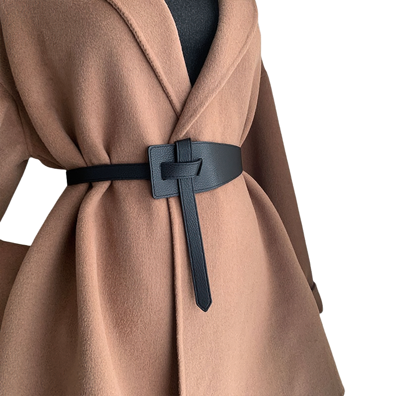 Stylish black soft PU leather belt accessorizing a chic brown coat for women's casual fashion.