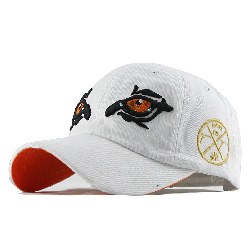 Stylish white cotton baseball cap with embroidered eagle eye design, perfect casual accessory for unisex fashion lovers.