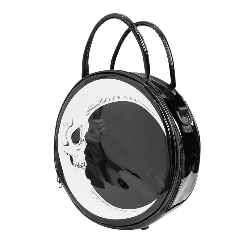 Stylish crescent moon handbag with skull design, perfect gothic accessory for women.