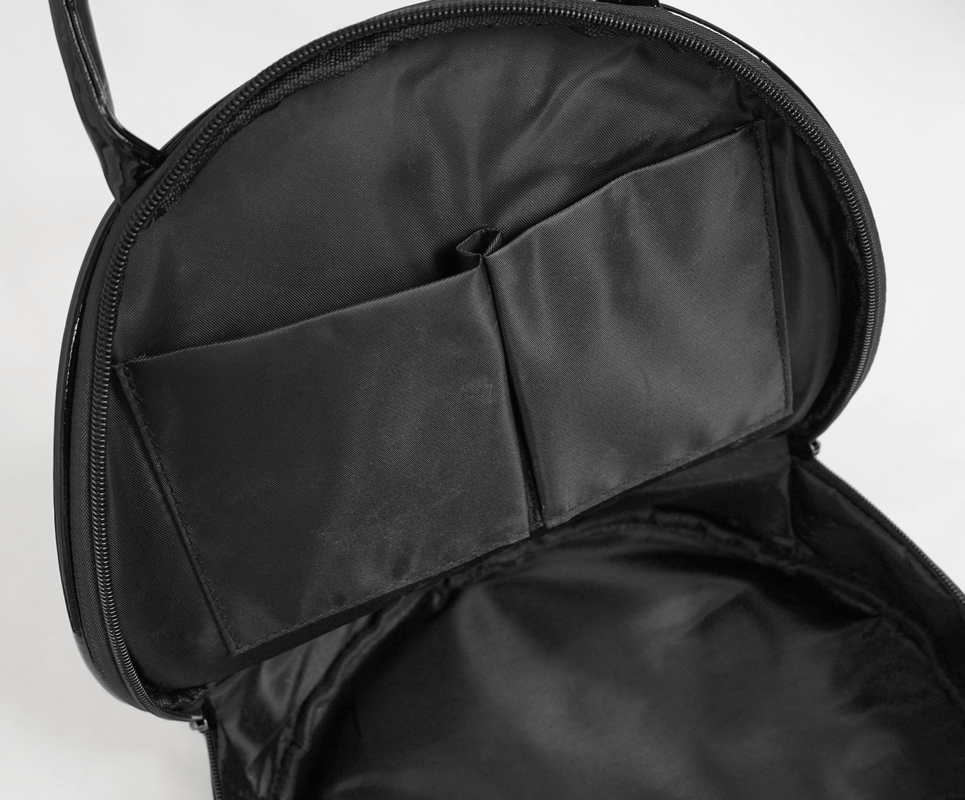 Interior of stylish crescent moon handbag featuring two pockets, perfect for organizing your gothic essentials.