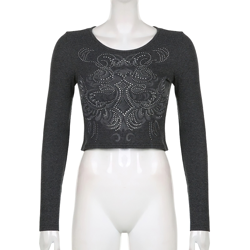 Stylish women's black cropped slim top with long sleeves and eye-catching print for trendy streetwear.