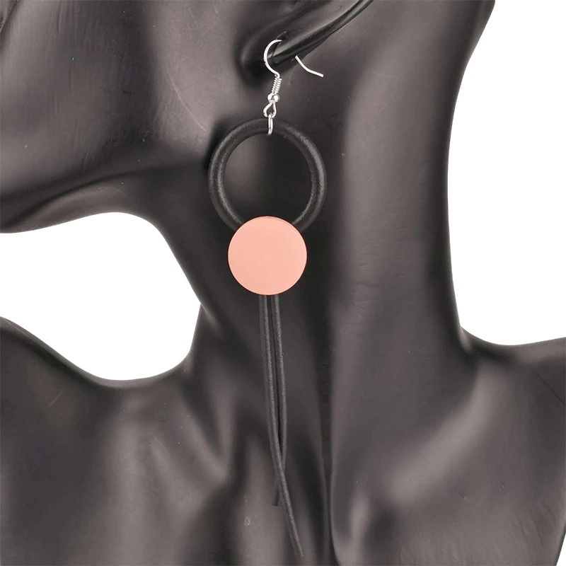 Stylish gothic wood long earrings for women, featuring a black rubber design and a chic pink accent.