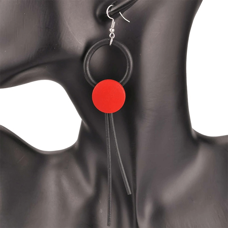 Stylish gothic long earrings featuring a red circular design and black rubber accents, perfect accessory for women.