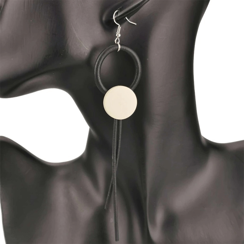 Stylish women's long wooden earrings with gothic design and rubber accents, perfect for a fashionable look.